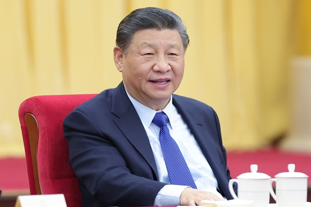 習近平看望參加政協(xié)會議的民革科技界環(huán)境資源界委員